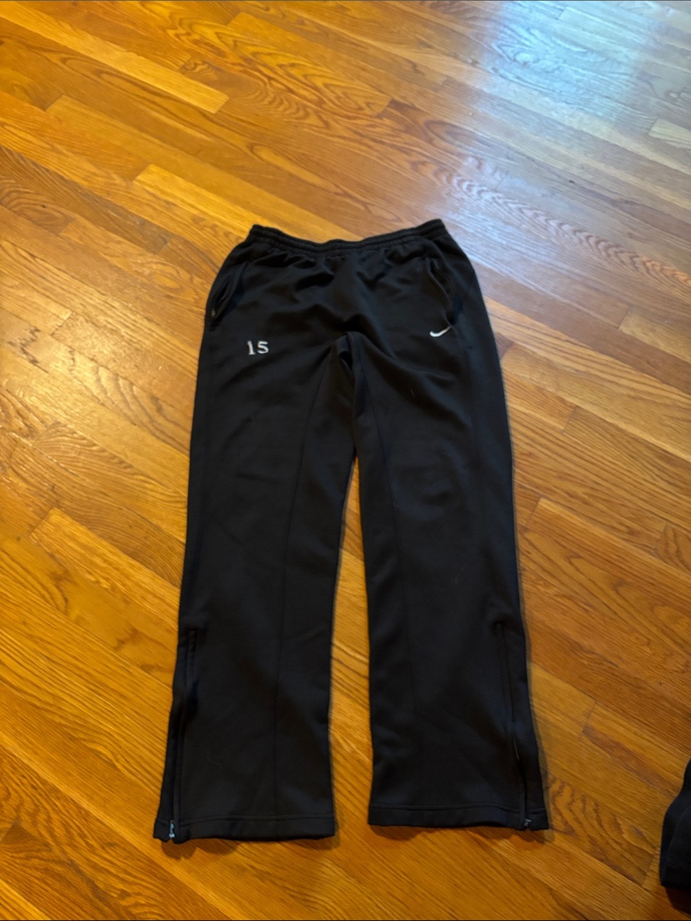 Nike unisex Black Track Joggers with White Logo